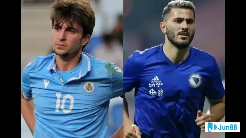 Cầu thủ Áo với áo đỏ đang tấn công trước hàng phòng ngự của San Marino trong trận đấu. Cầu thủ Áo với áo đỏ đang tấn công trước hàng phòng ngự của San Marino trong trận đấu.